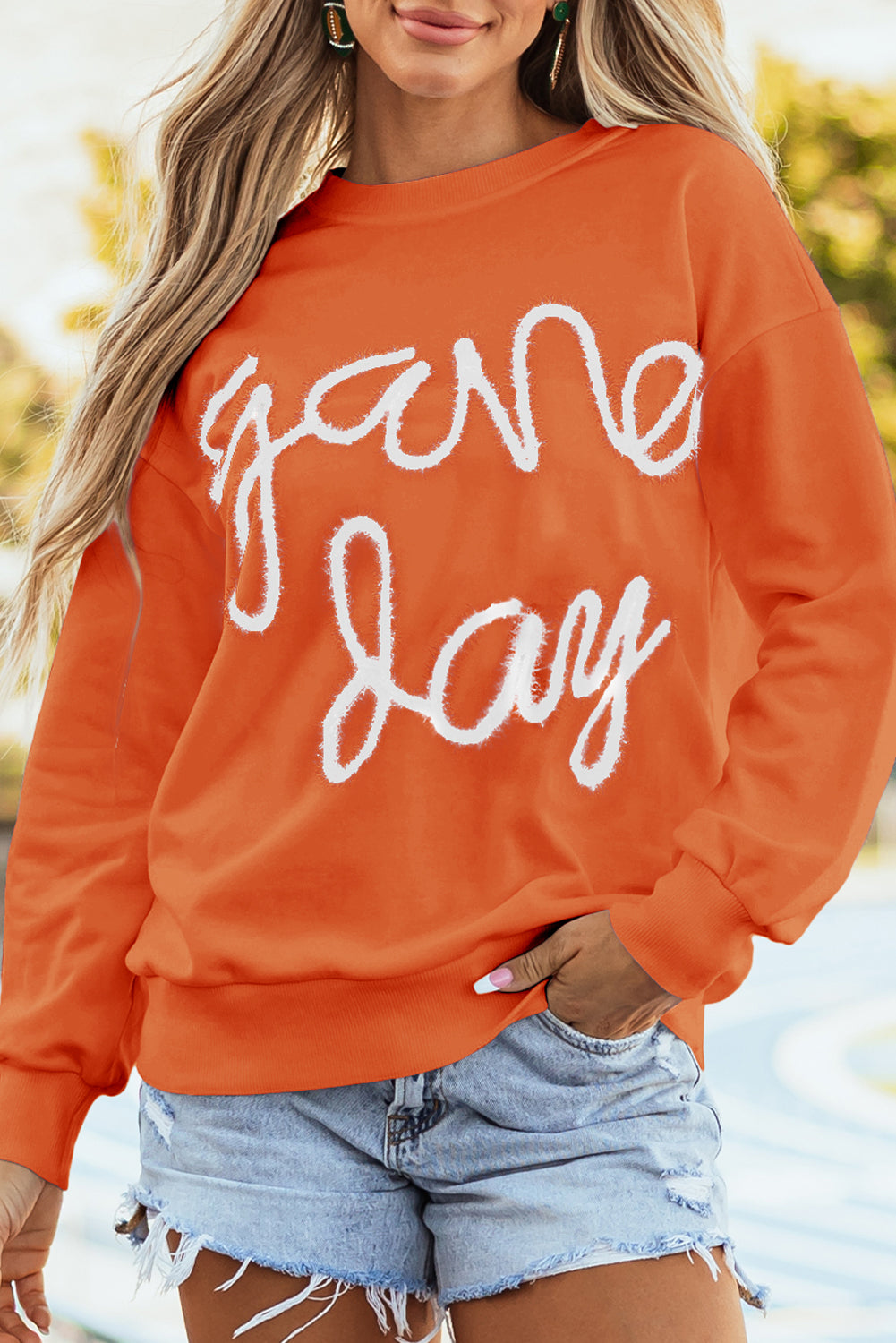 Tinsel Game Day - Sweat-shirt graphique a épaules tombantes