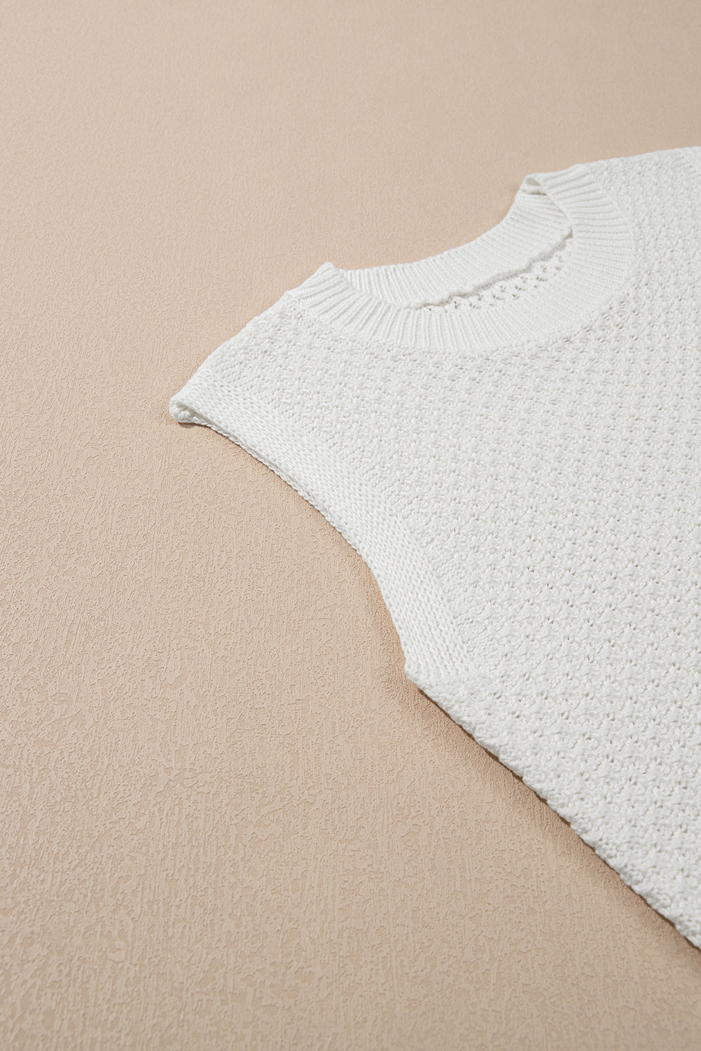 Gilet pull a col rond en tricot a œillets de couleur unie