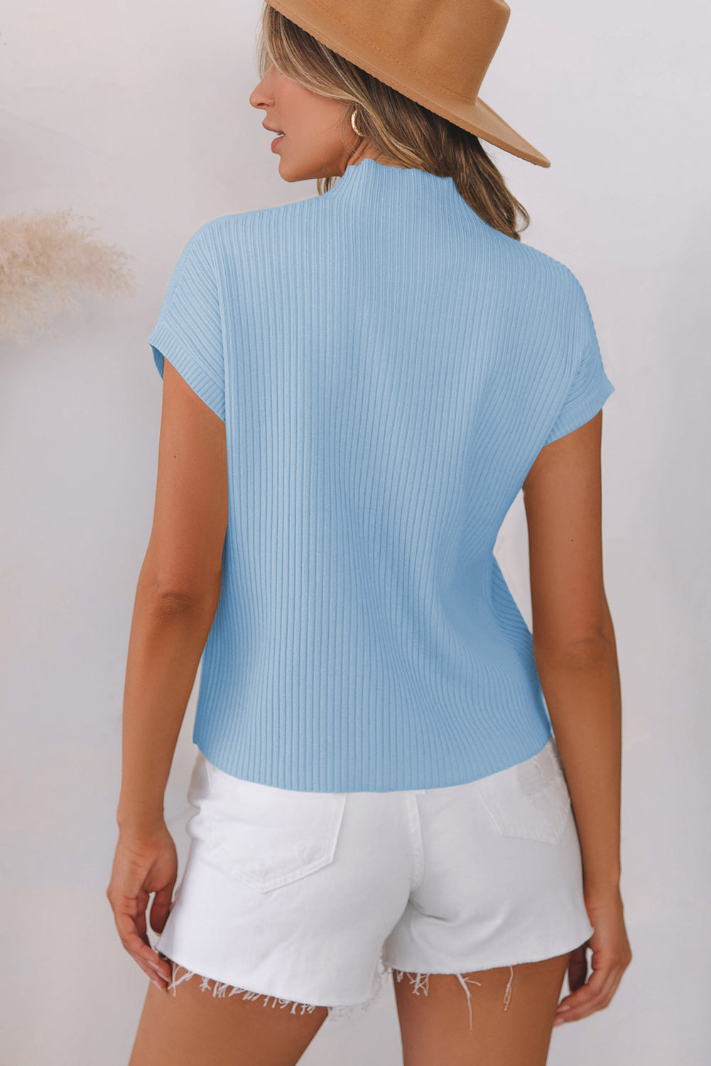 Pull a manches courtes en tricot côtelé avec poche plaquée