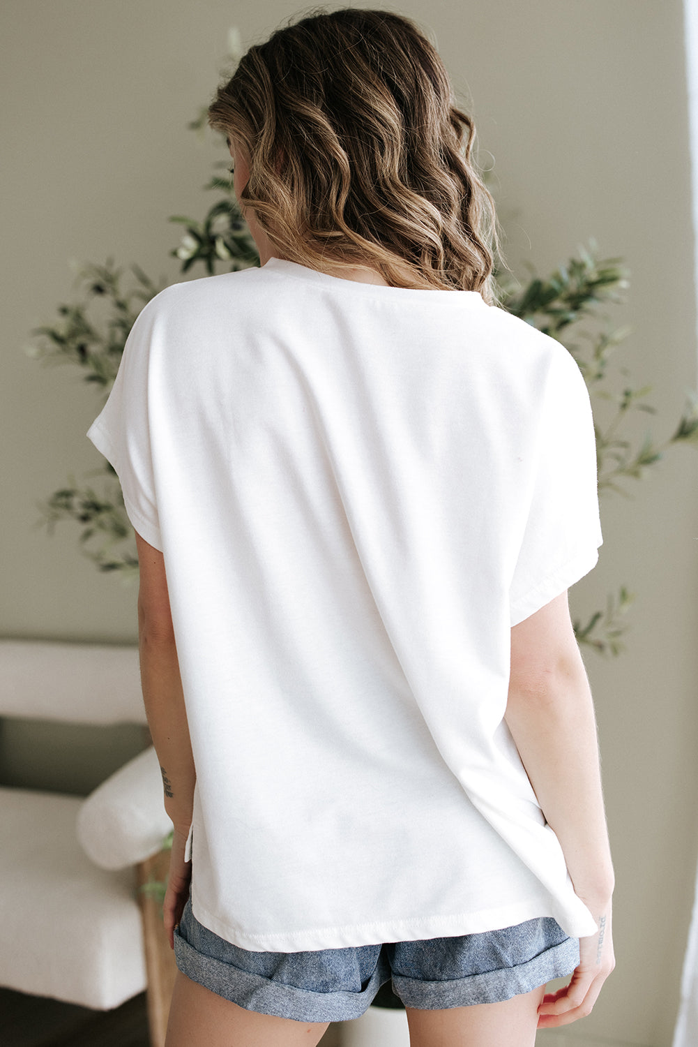 Haut à manches dolman et col en V cranté avec appliques florales