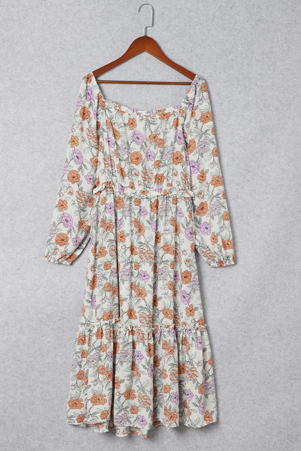 Robe fleurie smockée a manches longues et poches