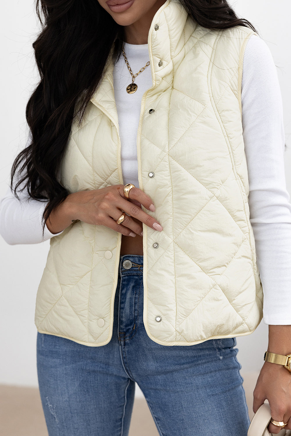 Manteau gilet matelassé a col haut et boutonné avec poche