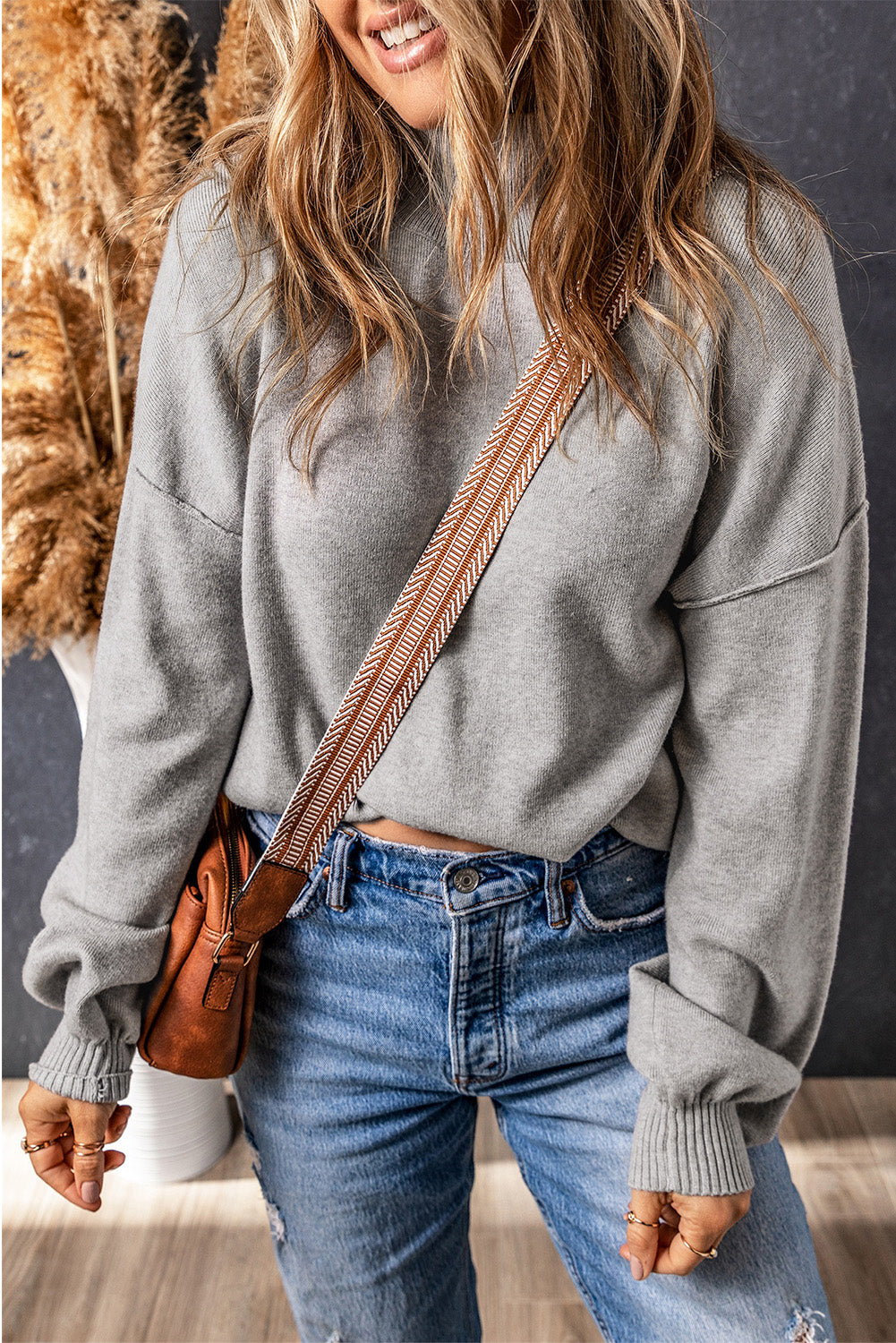 Pull en tricot à col roulé, épaules tombantes et manches bulles