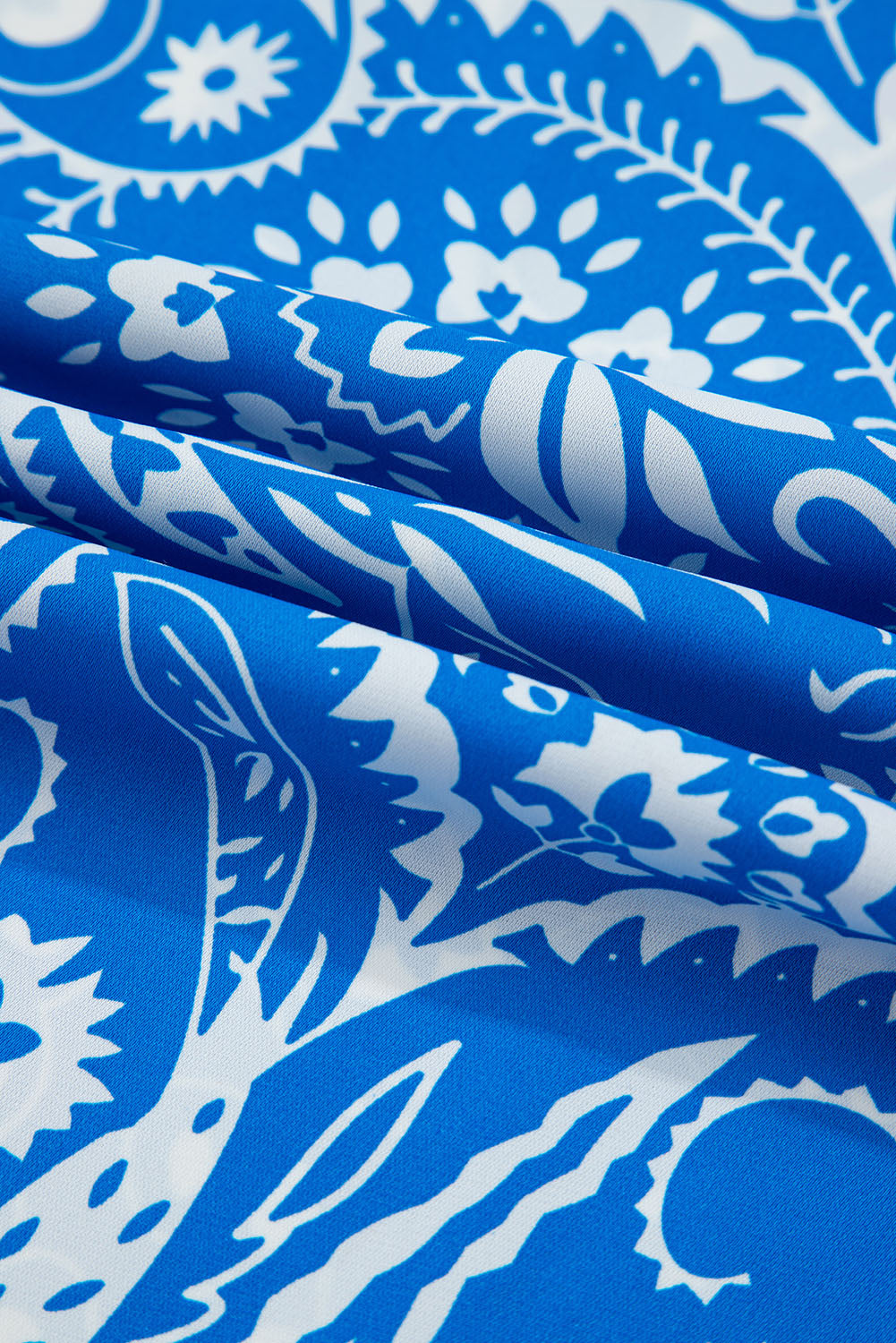 Robe longue dos nu croisée à col en V et motif cachemire