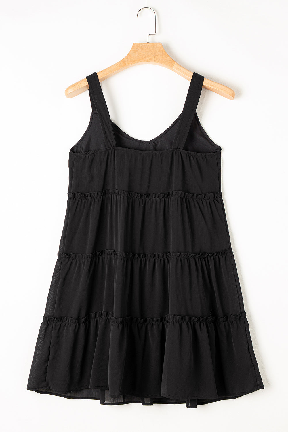 Robe sans manches à volants et col en V boutonné