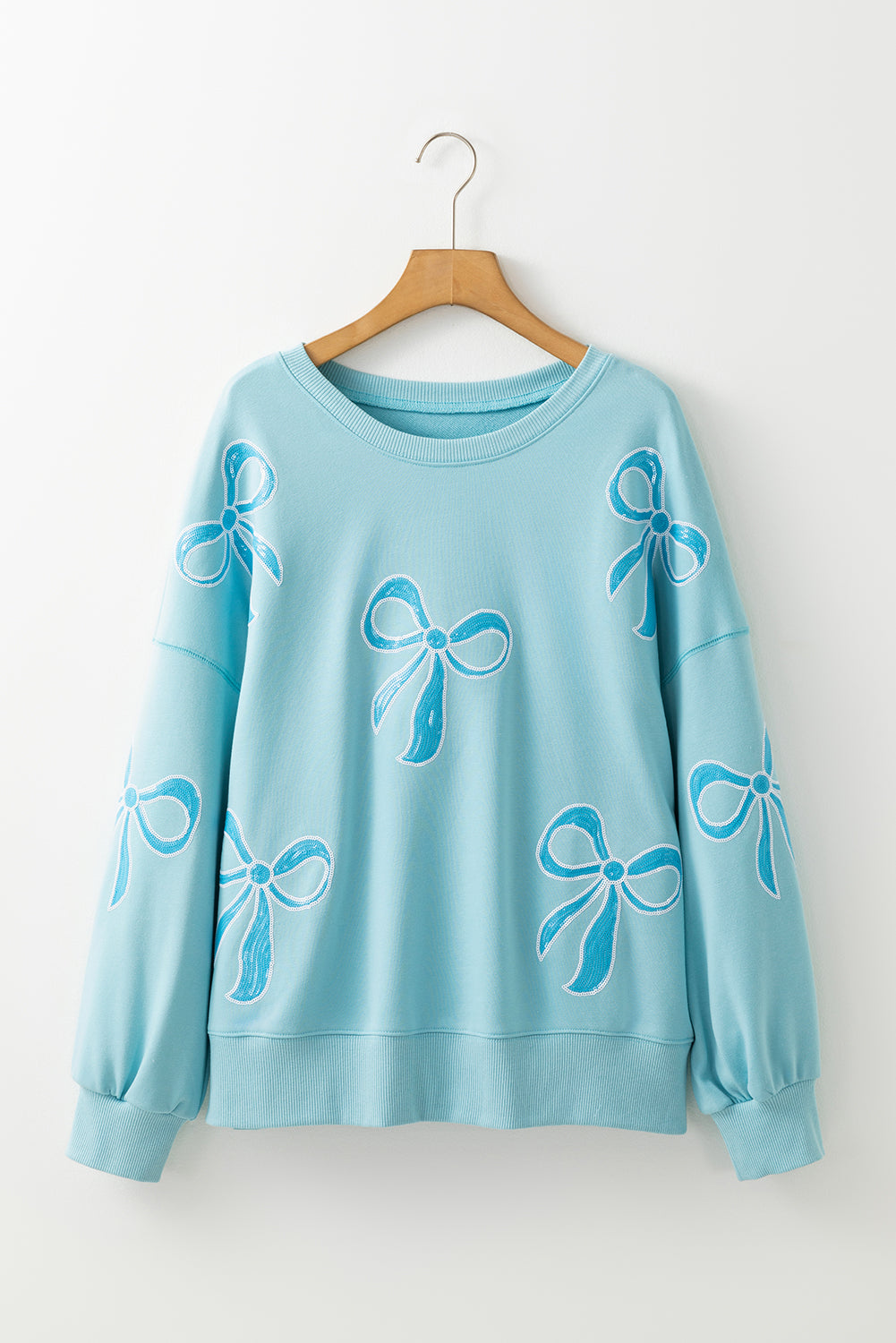 Sweat-shirt oversize à épaules tombantes et nœud papillon pailleté