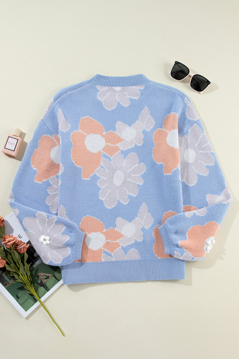 Pull tricoté fleuri a col rond et épaules tombantes