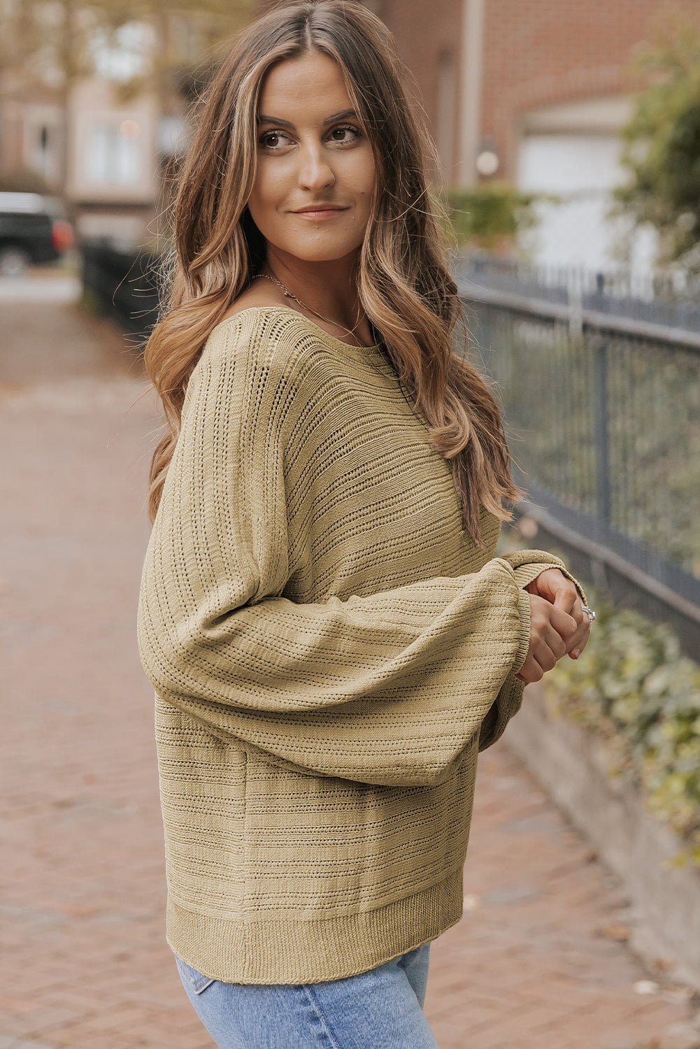 Pull en tricot texturé à œillets et manches lanternes