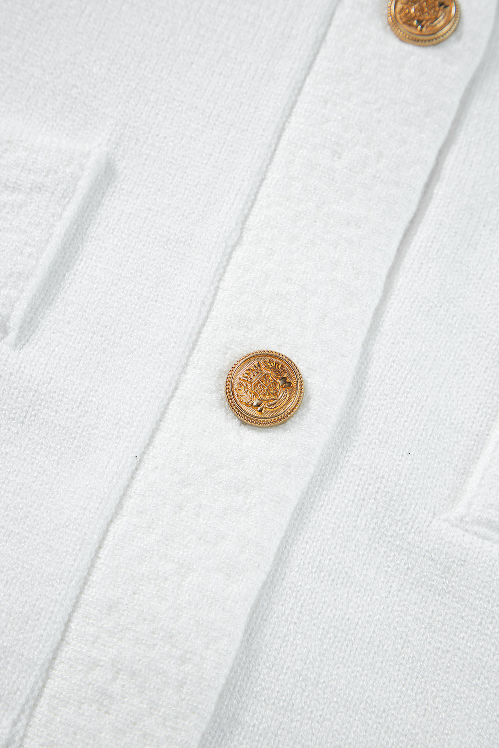T-shirt pull texturé a boutons dorés