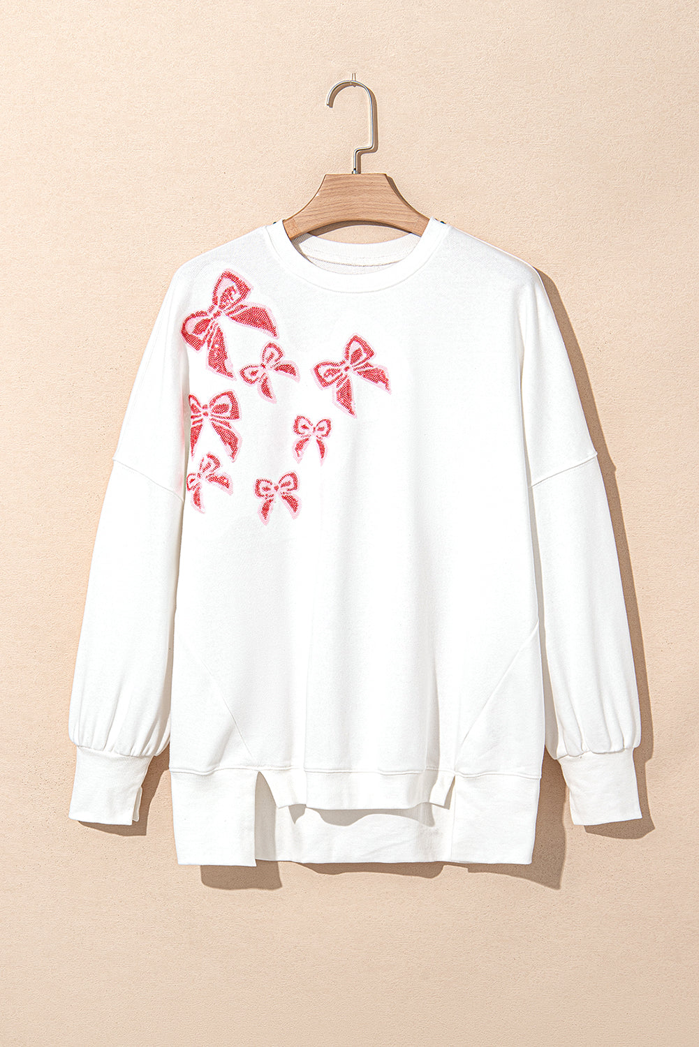 Sweat-shirt surdimensionné a paillettes et nœud papillon