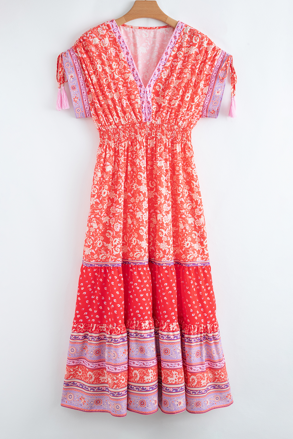 Robe longue taille empire à imprimé floral et manches nouées à pompons