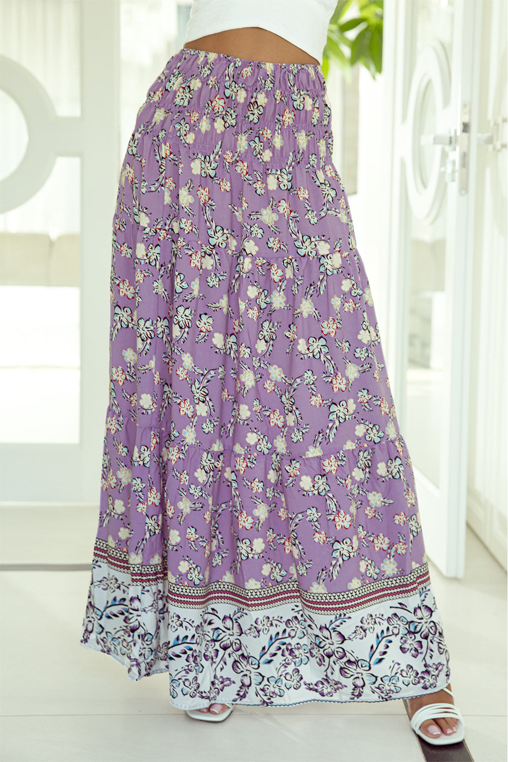 Jupe longue taille haute froncée à imprimé floral