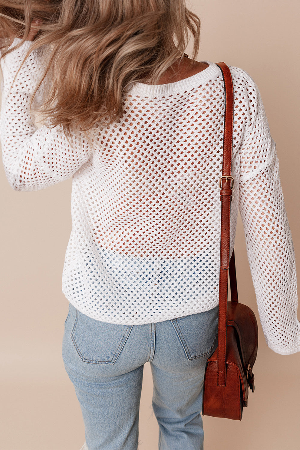 Pull en tricot ouvert à col boutonné et manches fendues