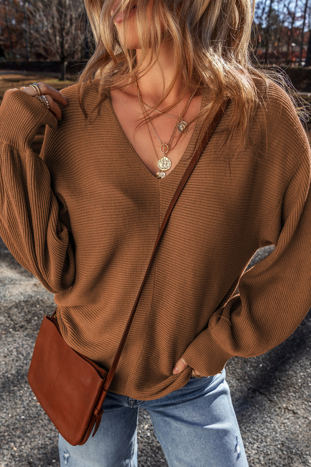 Pull ample en tricot côtelé a manches tombantes et col en V