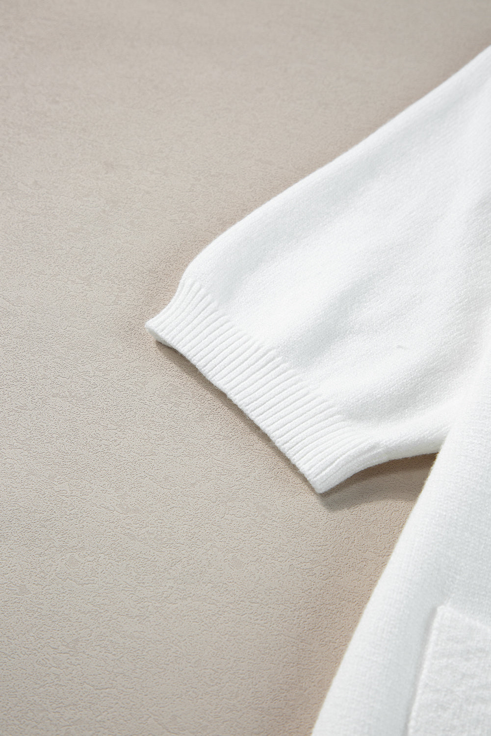 T-shirt pull texturé a boutons dorés