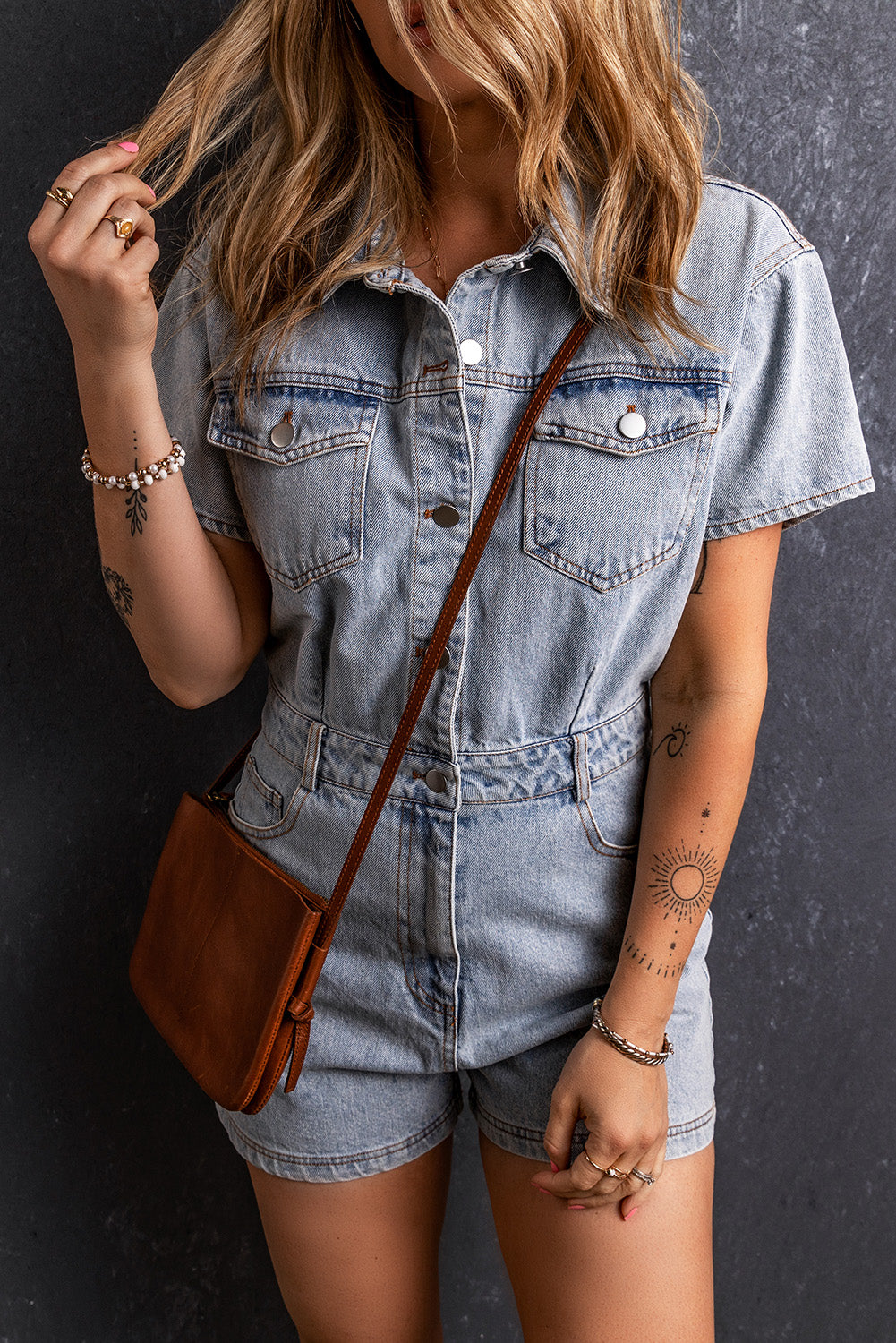 Barboteuse en denim avec poches et boutons délavés vintage