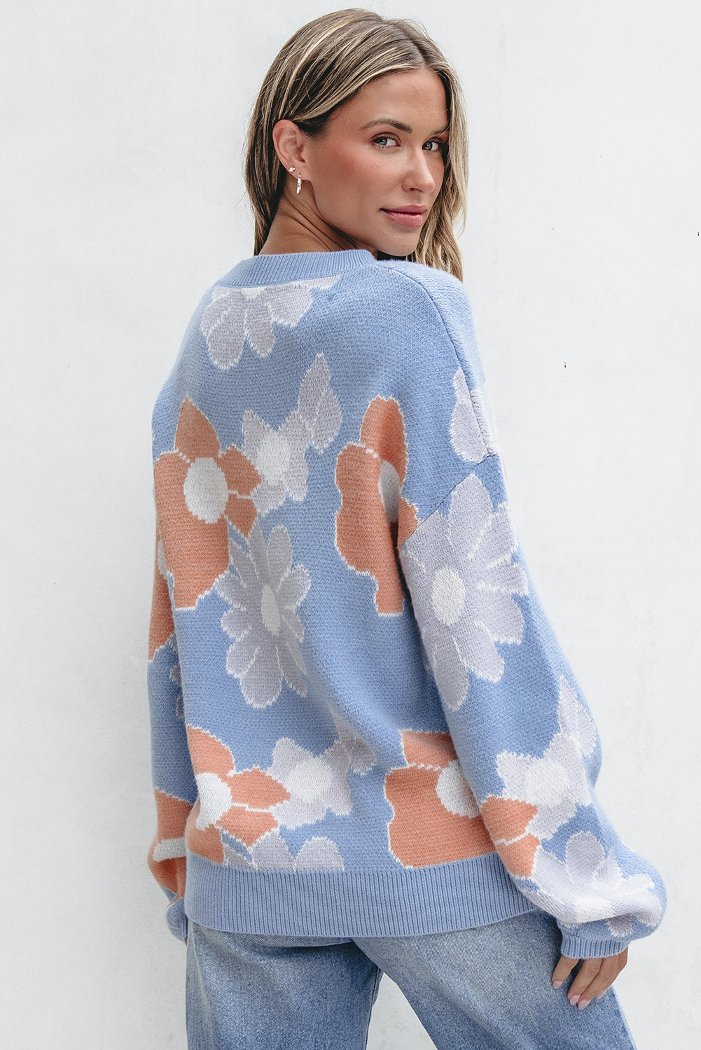 Pull tricoté fleuri a col rond et épaules tombantes
