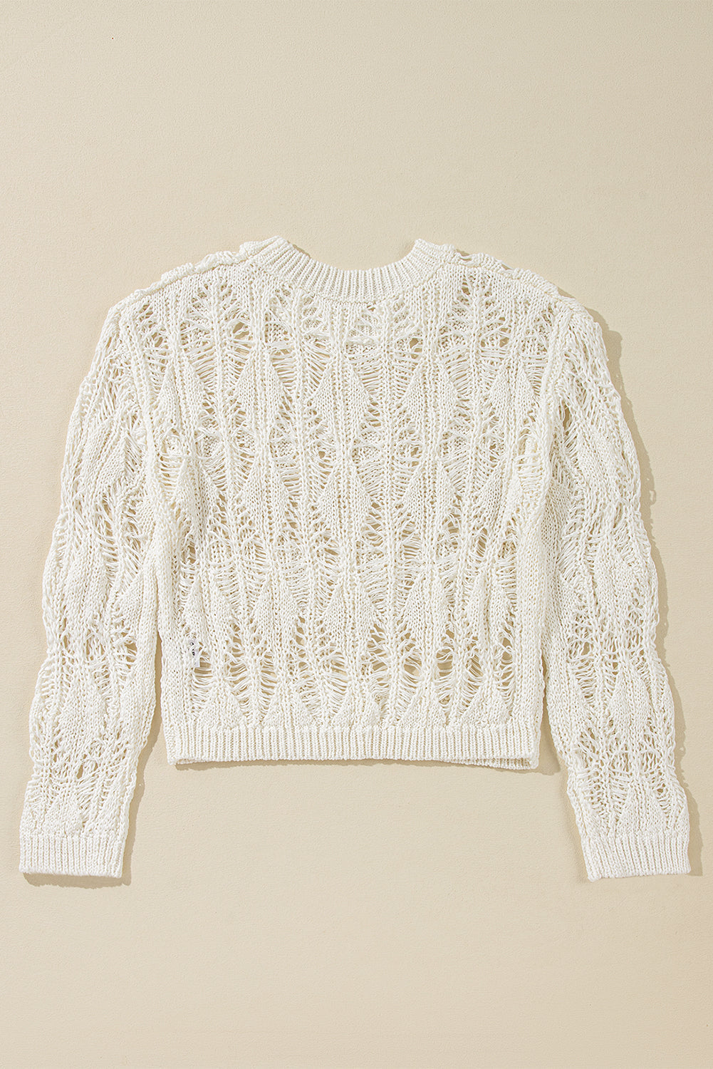 Pull coupe ample à col ras du cou et découpes en crochet