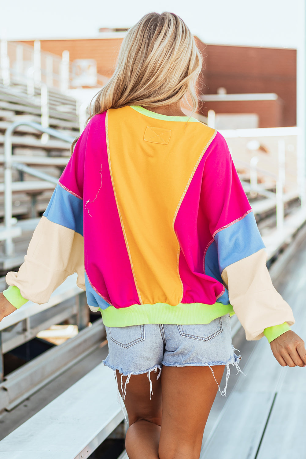 Haut oversize a coutures apparentes et patchwork de couleurs