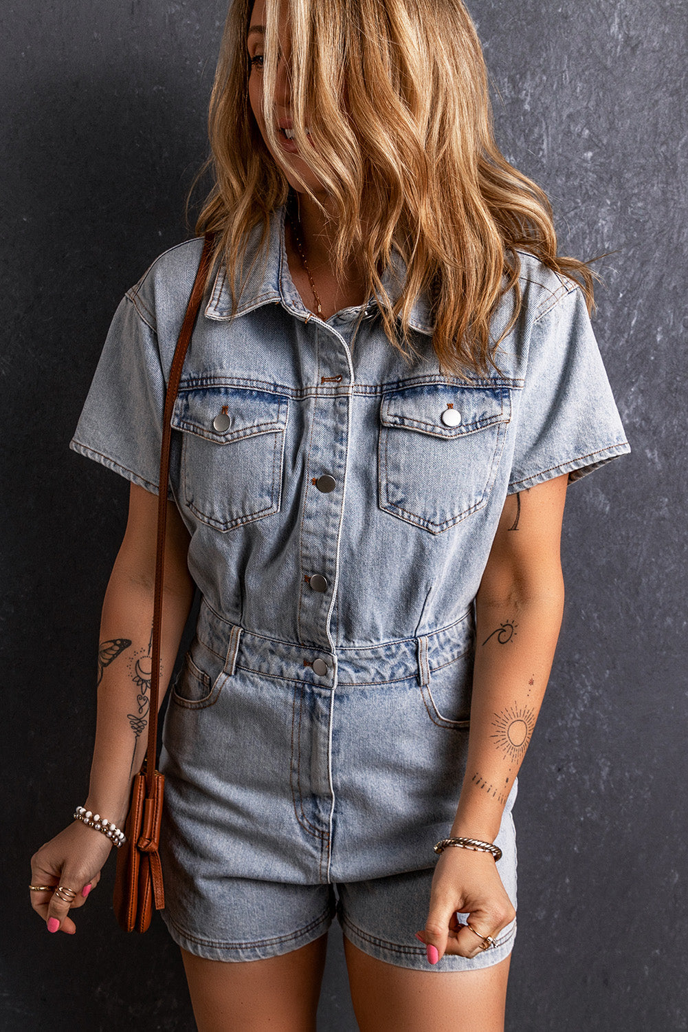 Barboteuse en denim avec poches et boutons délavés vintage