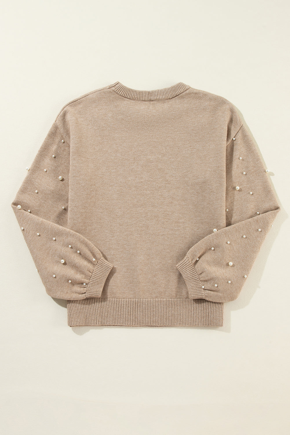 Pull à col rond et épaules tombantes perlées