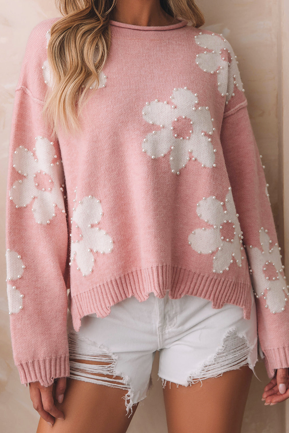Pull à épaules tombantes et fleurs perlées