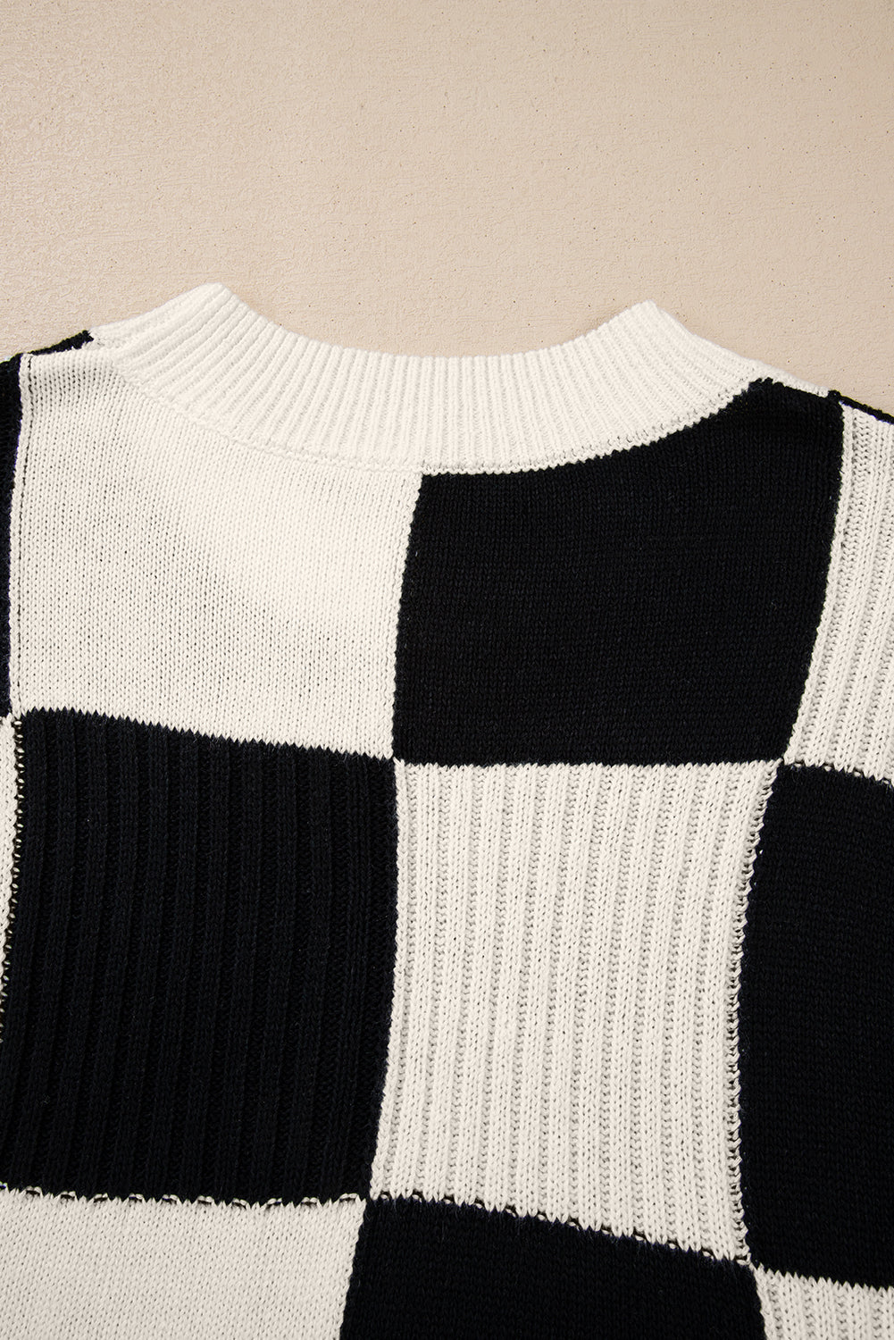 Pull a carreaux et manches courtes a col rond et blocs de couleurs