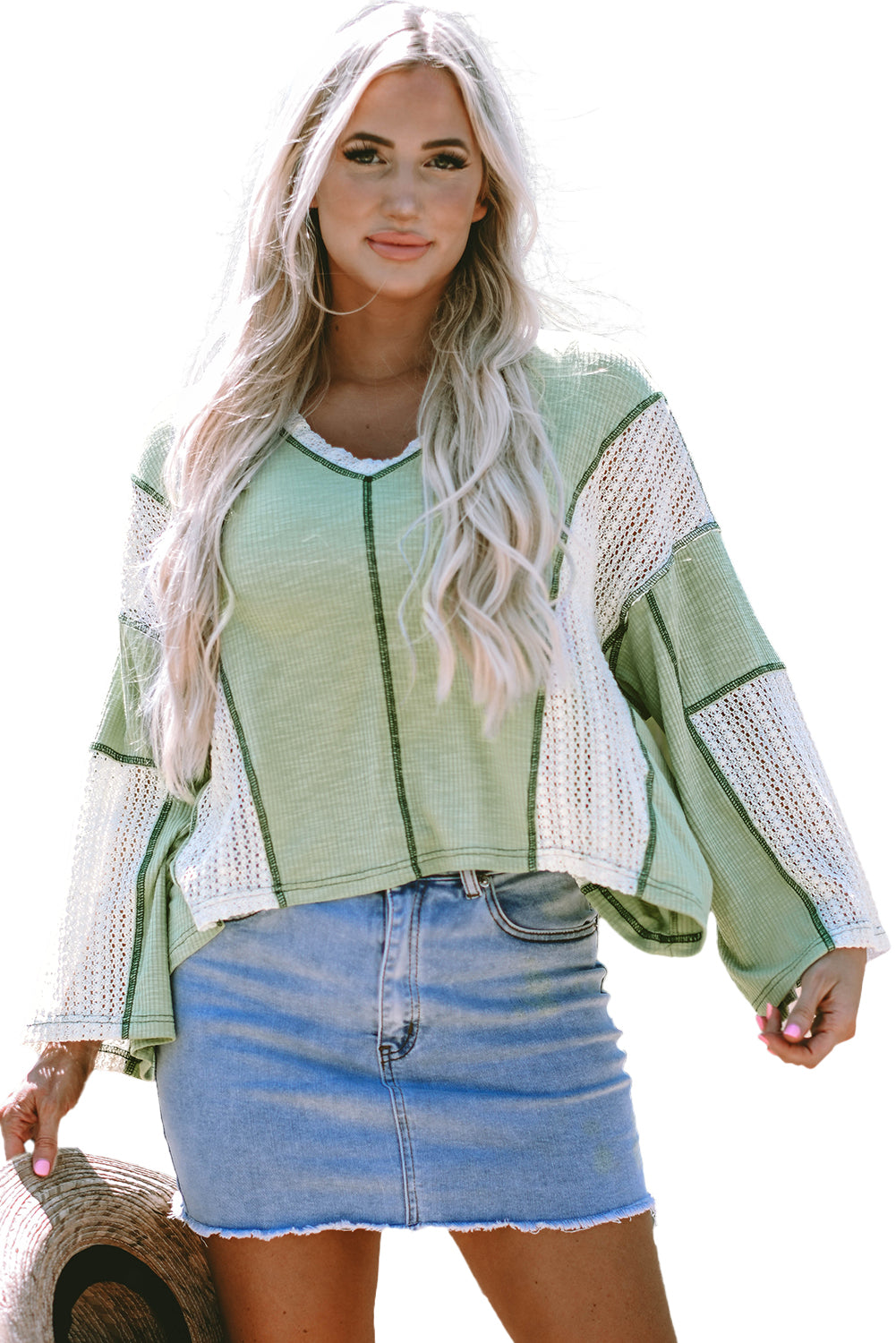 Haut ample haut bas avec détails en crochet et coutures apparentes