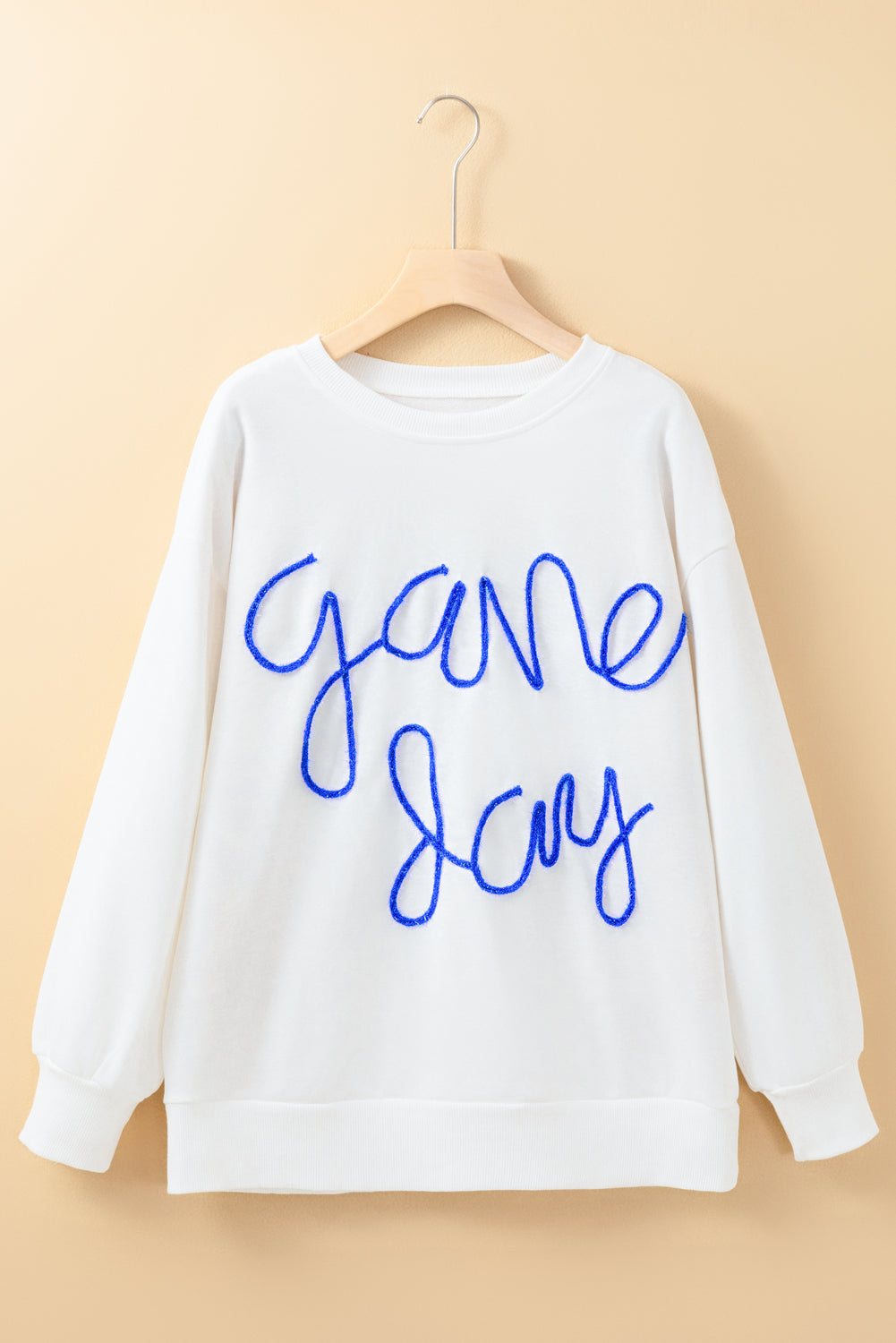Tinsel Game Day - Sweat-shirt graphique a épaules tombantes