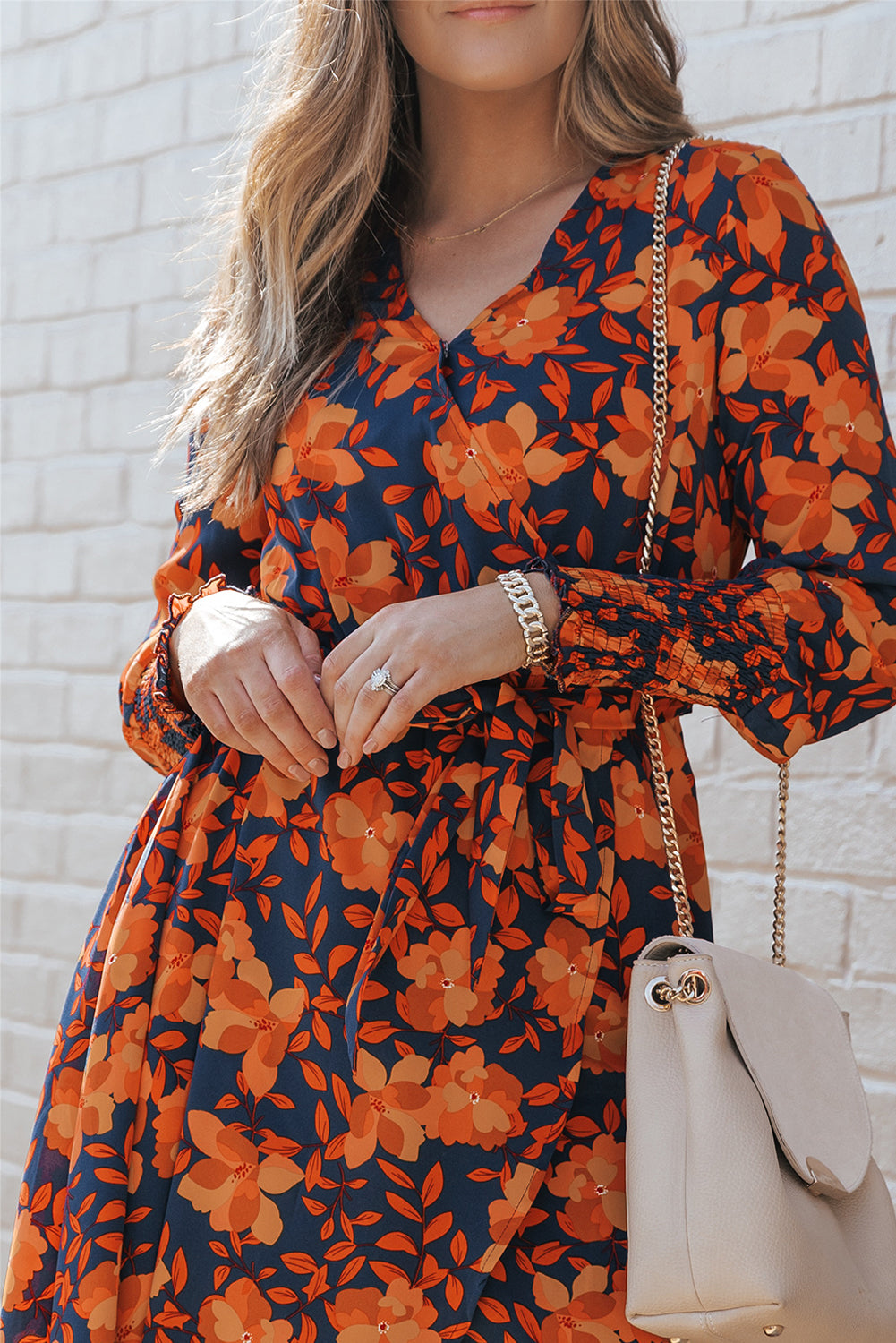 Robe portefeuille orange à imprimé floral et ceinture