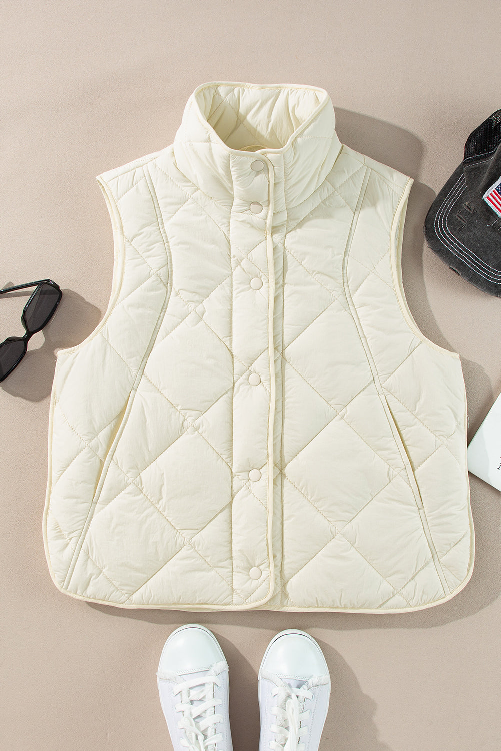 Manteau gilet matelassé a col haut et boutonné avec poche