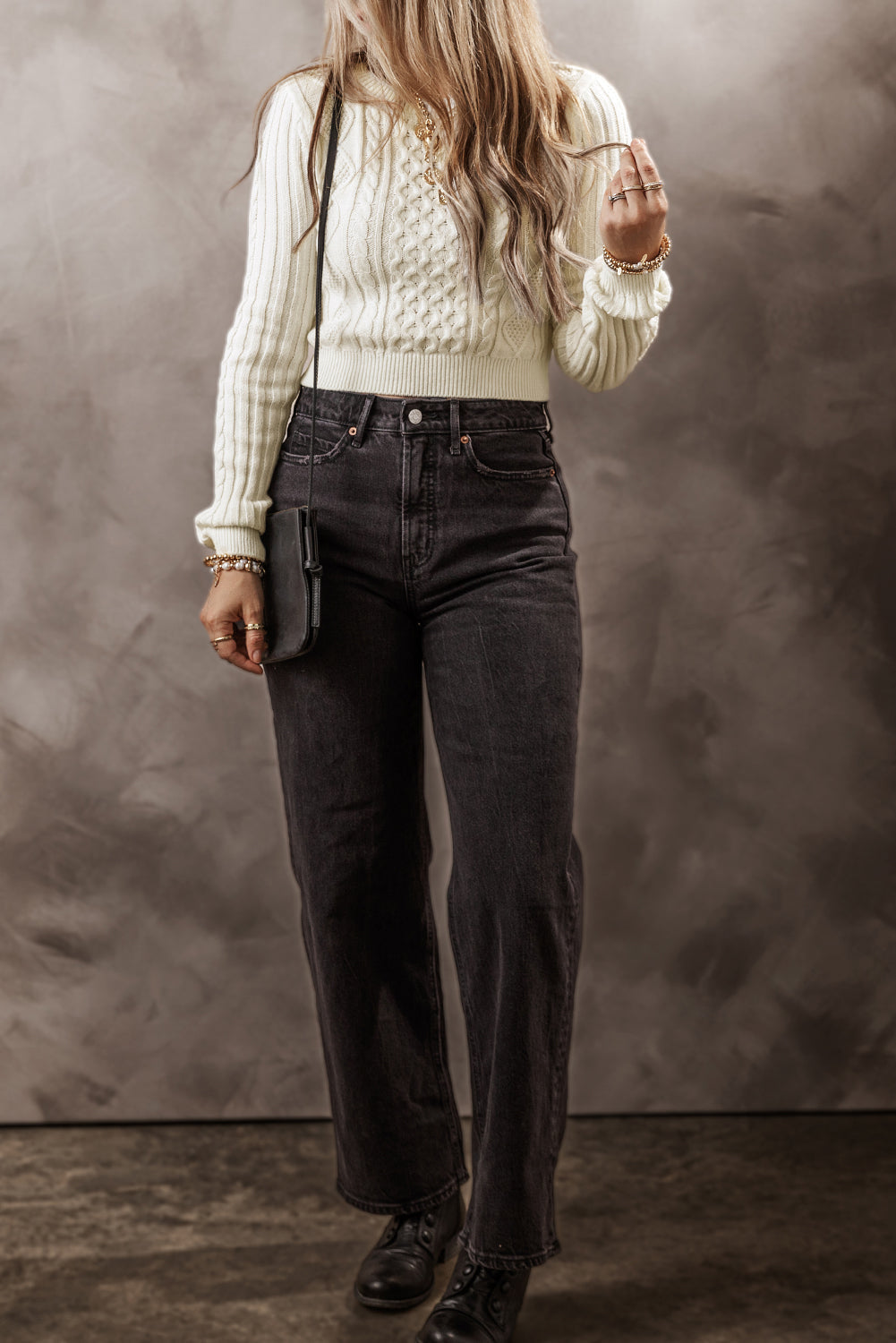 Pull court en tricot torsadé