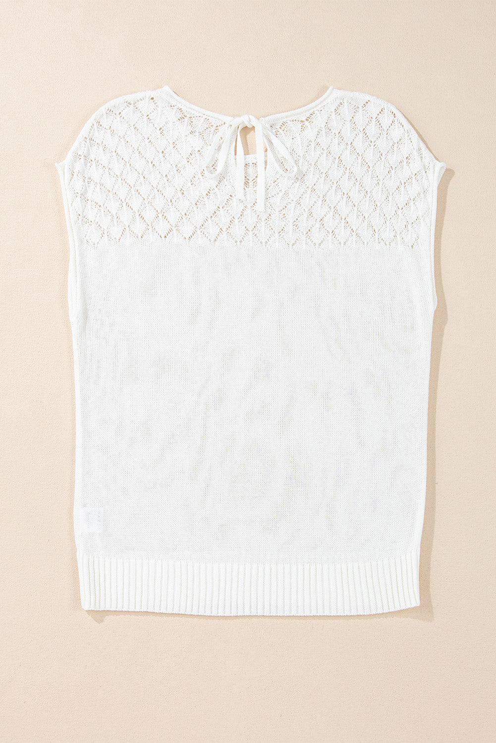Pull a manches courtes en tricot a œillets noué dans le dos