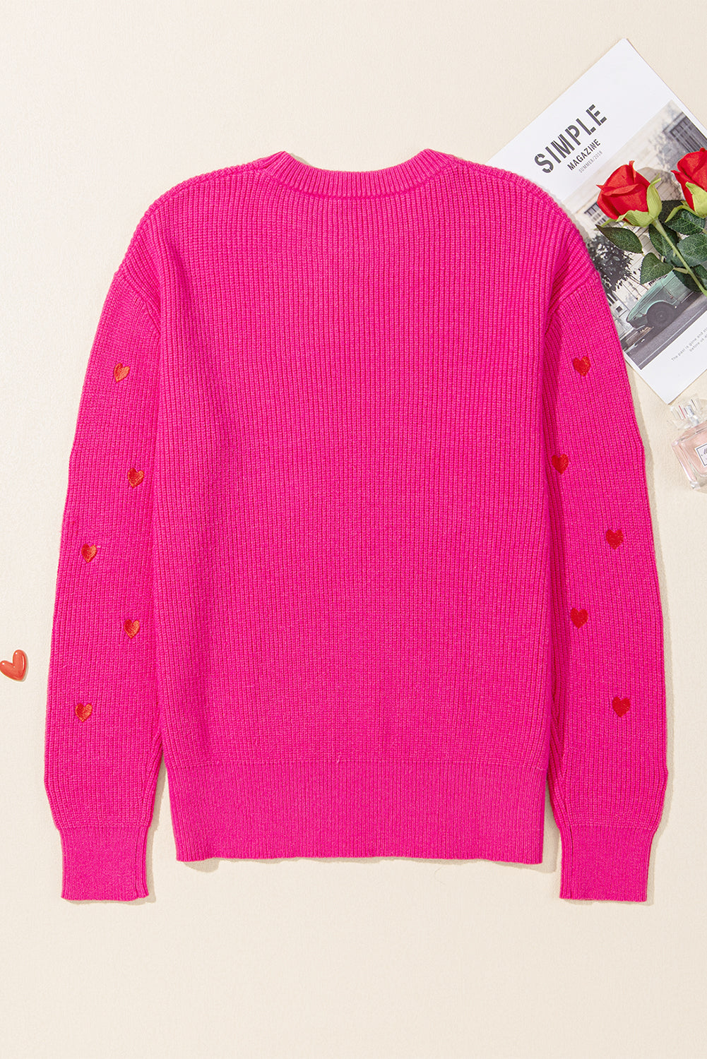 Pull a col rond et épaules tombantes en forme de cœur