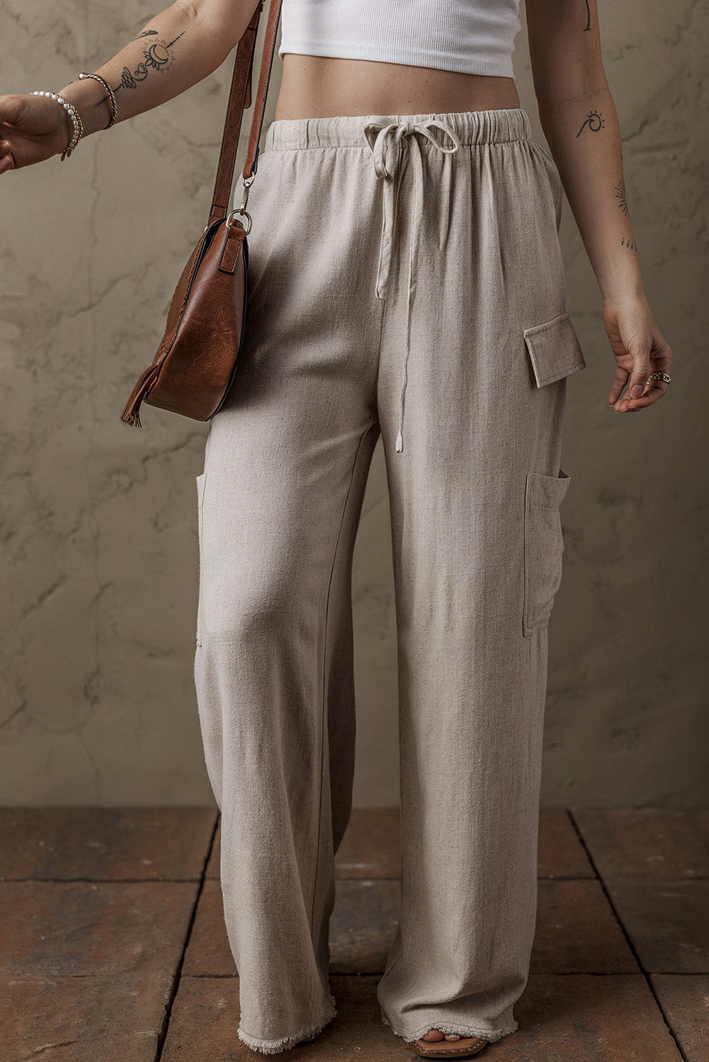 Pantalon ample cargo en lin style bohème avec cordon de serrage a la taille et bords bruts