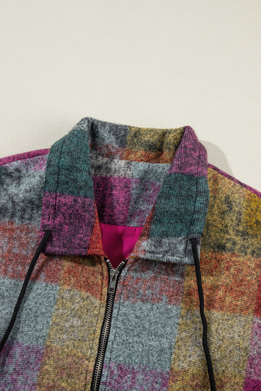 Gilet ample zippé a carreaux et poches latérales