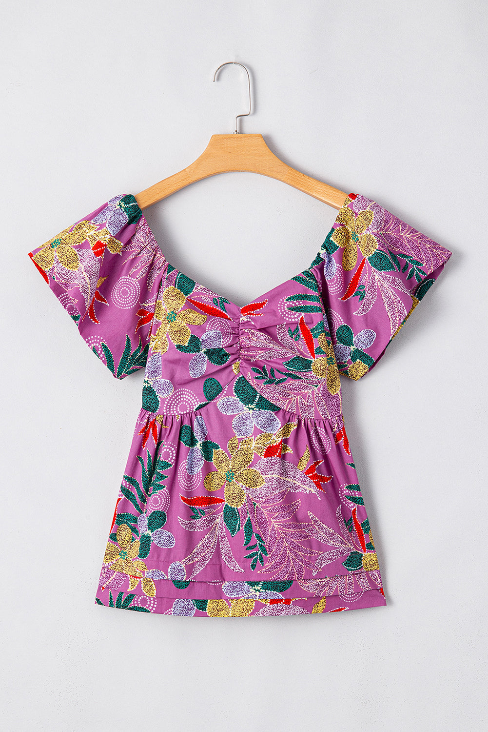 Chemisier à imprimé floral, col en cœur et manches flottantes