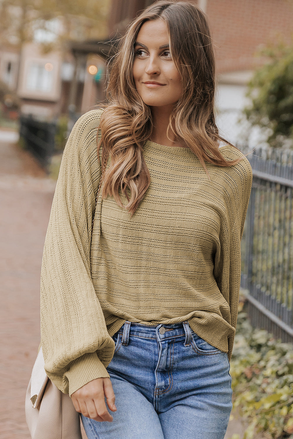 Pull en tricot texturé à œillets et manches lanternes