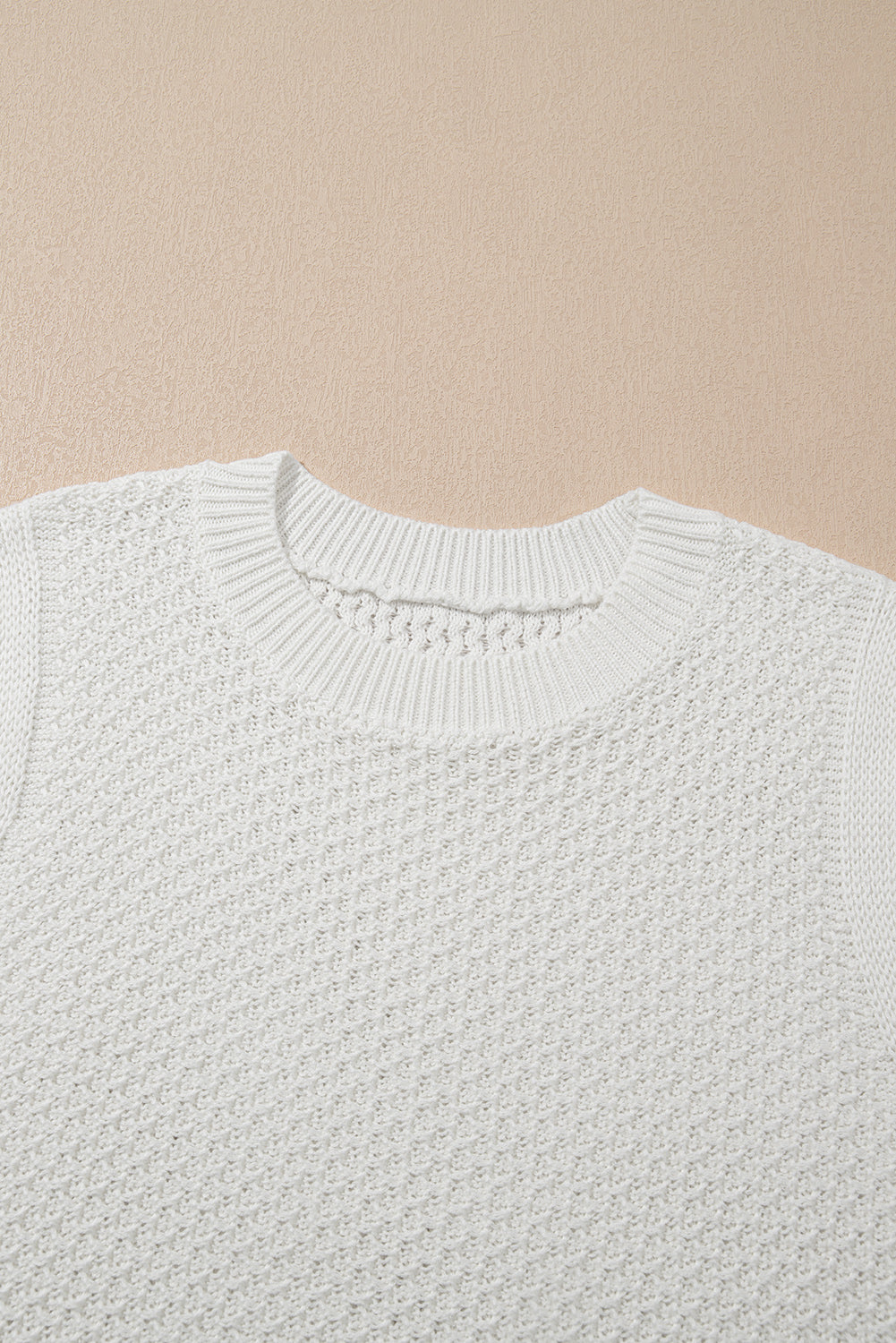 Gilet pull a col rond en tricot a œillets de couleur unie