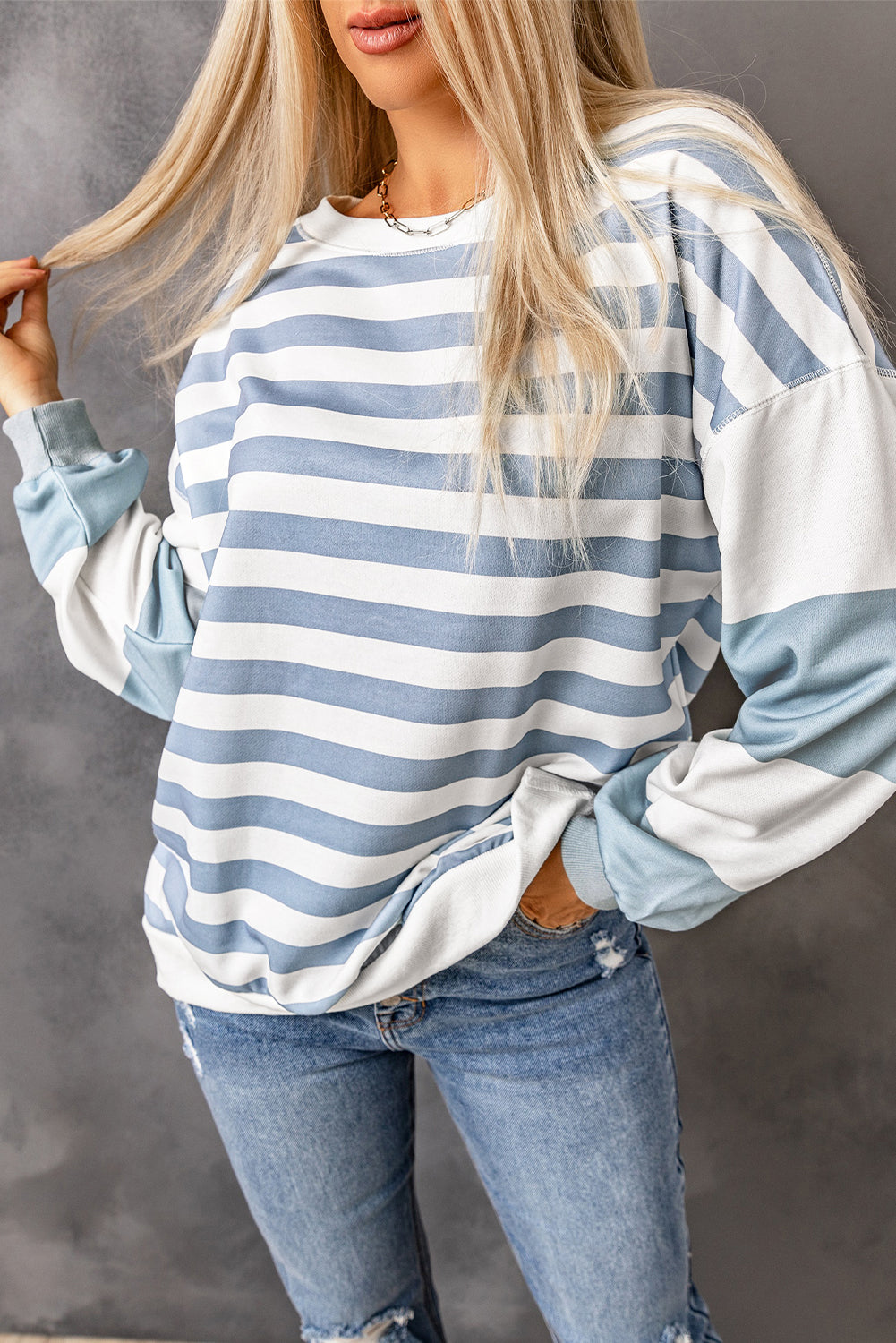 Sweat-shirt rayé à épaules tombantes