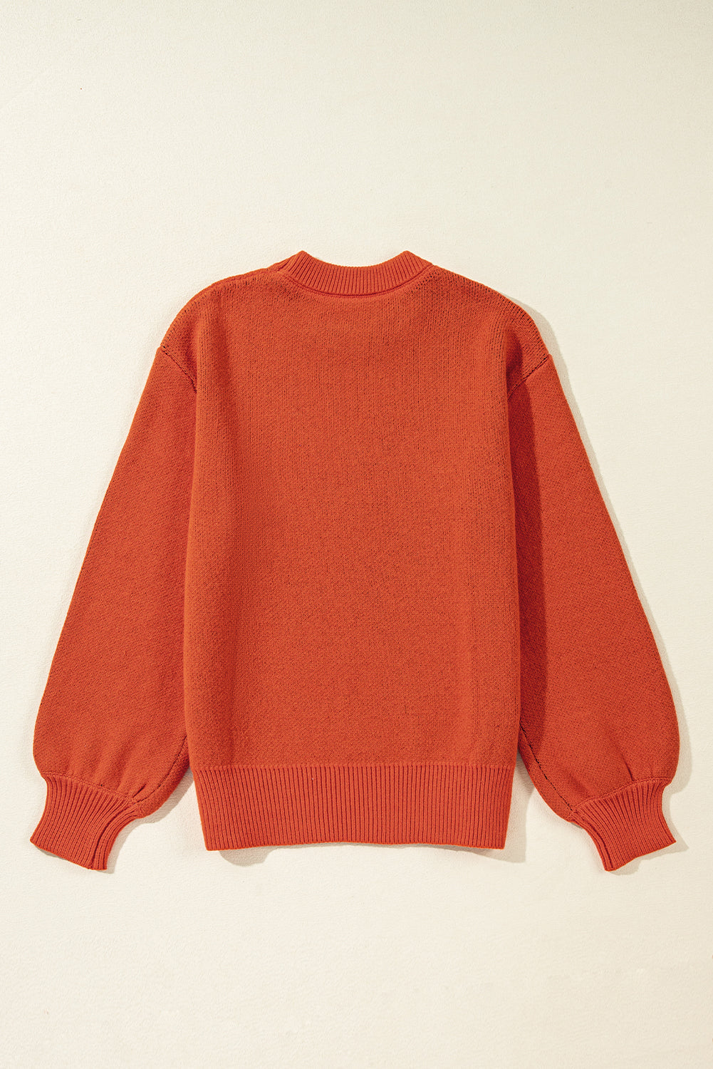 Pull a épaules tombantes a motif de visage de citrouille d'Halloween