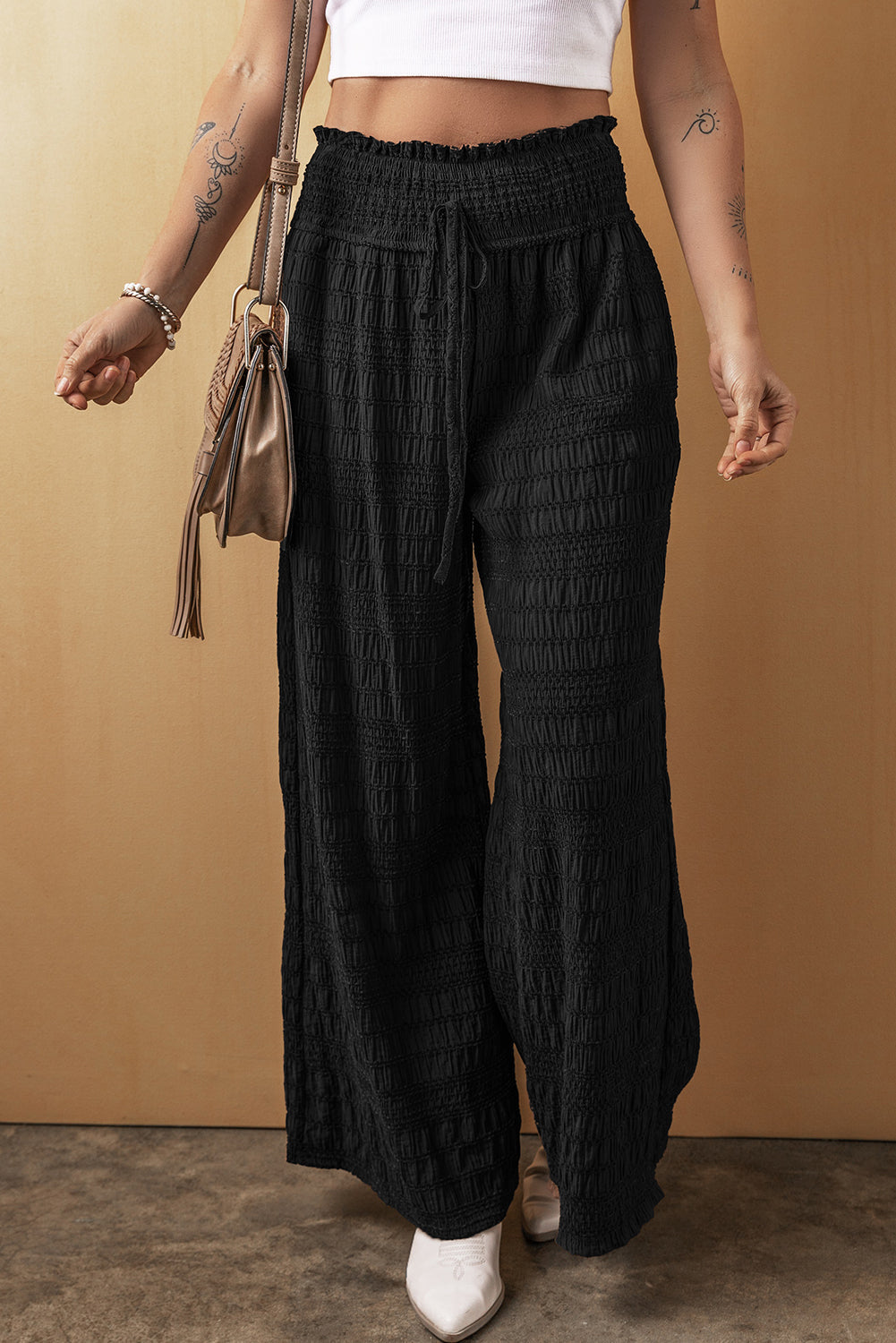 Pantalon ample texturé a taille smockée large