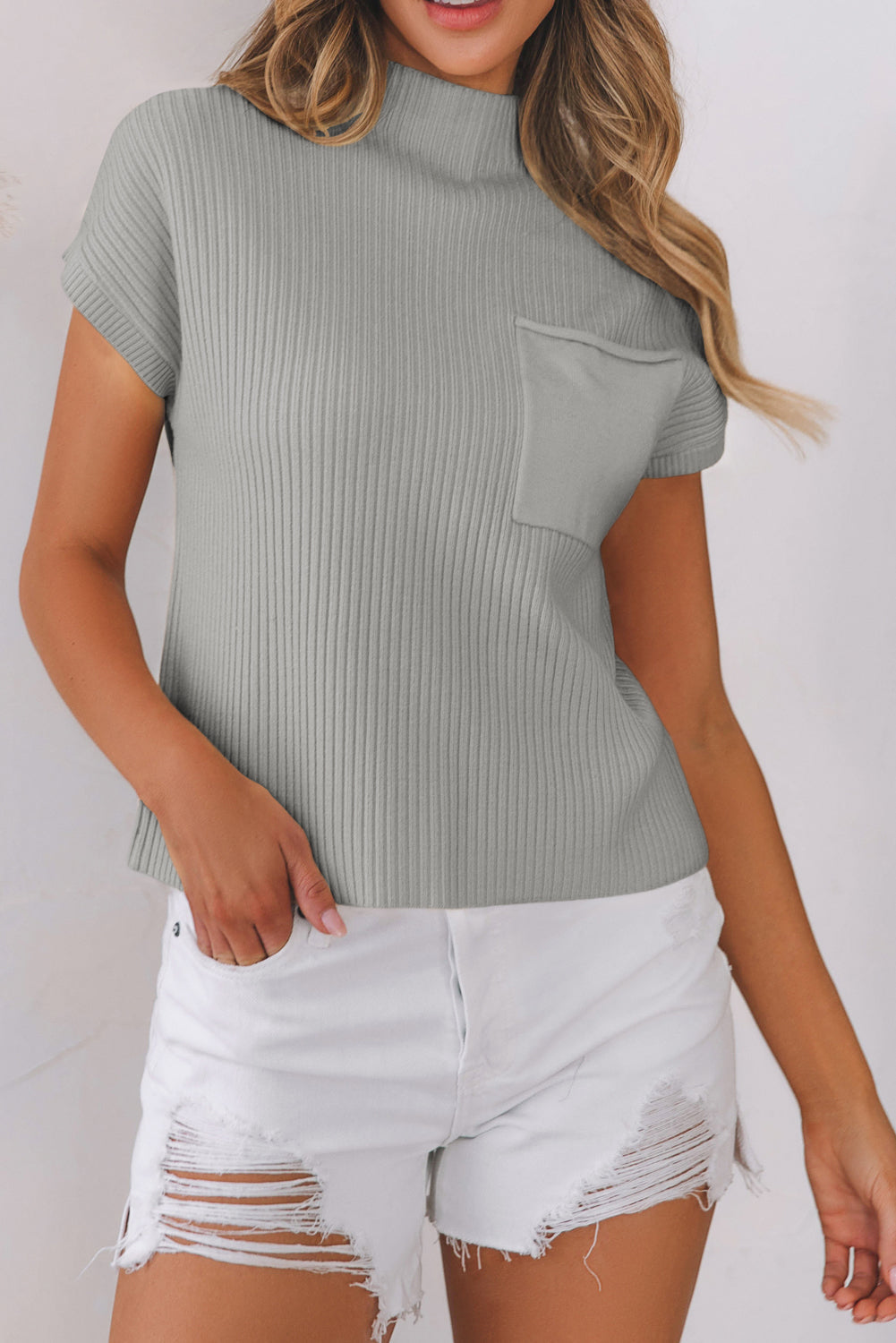 Pull a manches courtes en tricot côtelé avec poche plaquée