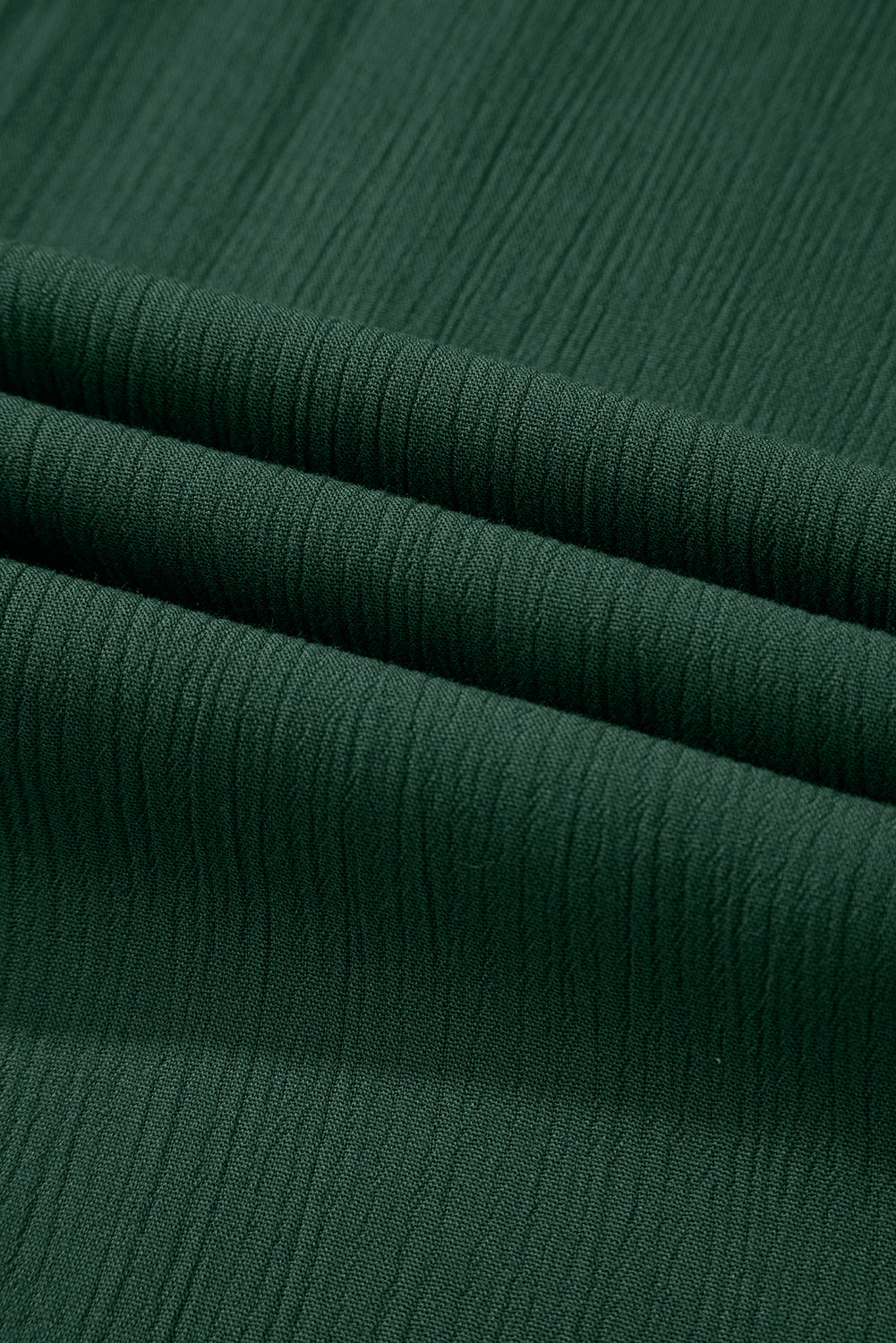 Robe longue ample à bretelles spaghetti et poches