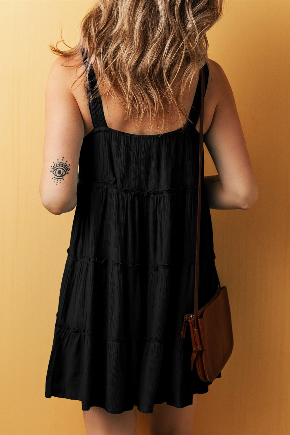 Robe sans manches à volants et col en V boutonné
