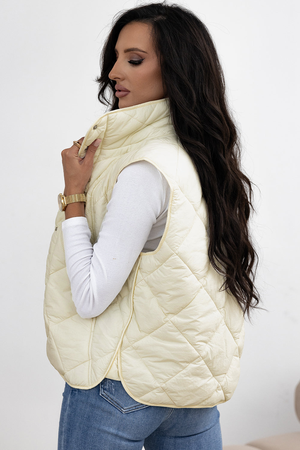 Manteau gilet matelassé a col haut et boutonné avec poche