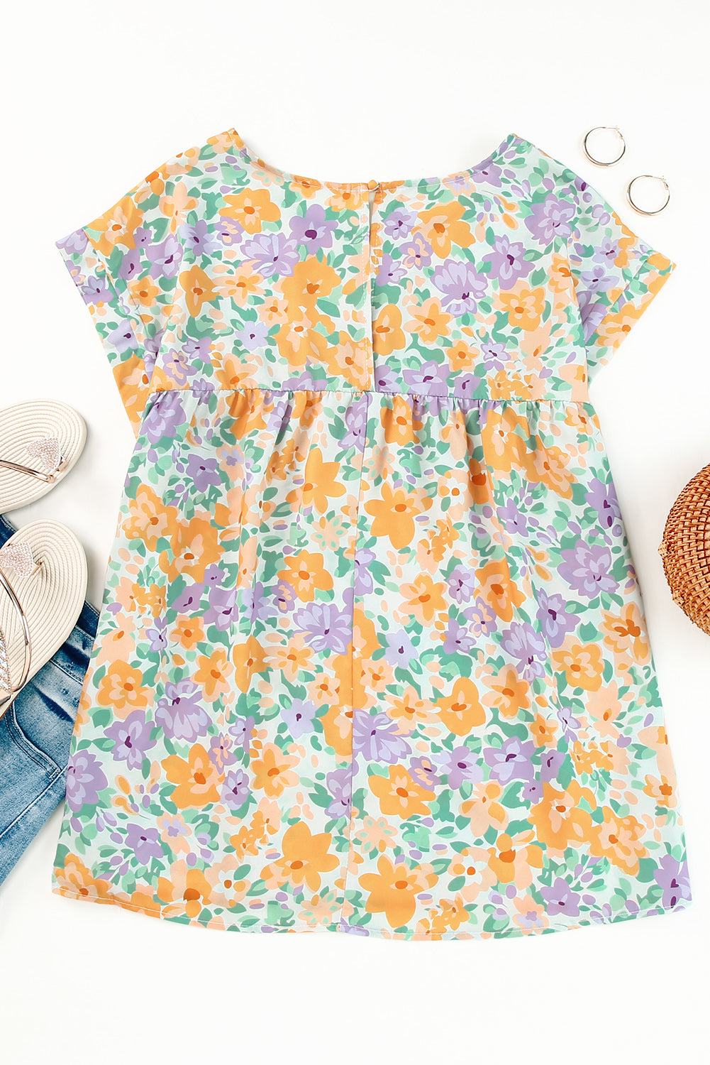 Chemisier babydoll à manches courtes et imprimé floral au dos