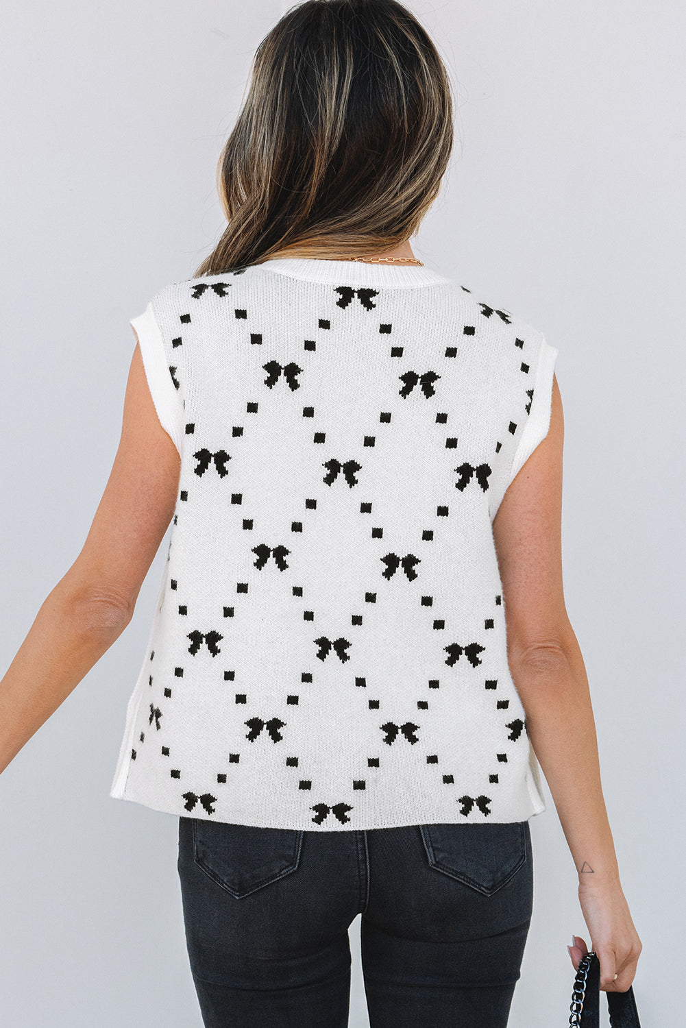 Gilet court boutonné à motif nœud sur le côté