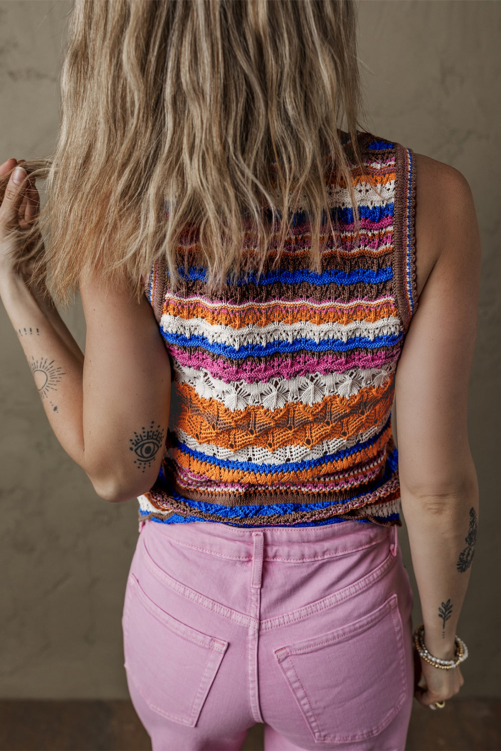 Gilet pull a col rond en tricot texturé rayé