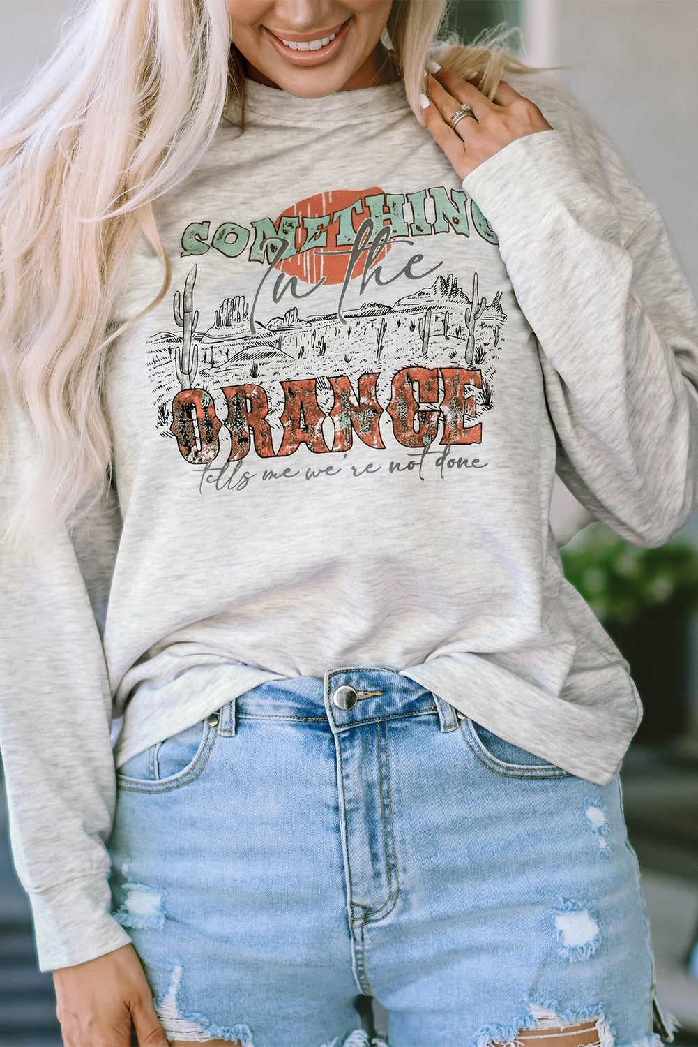 SOMETHING ORANGE Sweat-shirt décontracté graphique